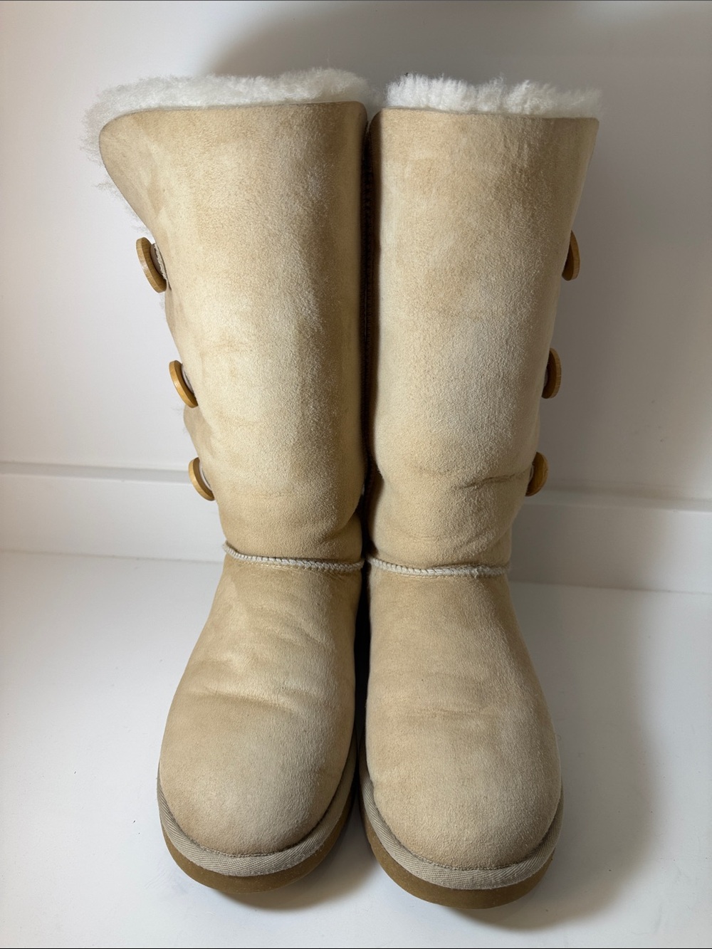 Preowned UGG Bailey Button Triplet Tall Shearling Boots - Sand/Cream - Size 9